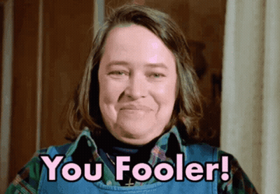 Woman In Plaid Shirt Smiling Says You Fooler GIF