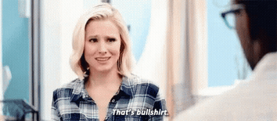 Woman In Plaid Shirt Talking To Man GIF