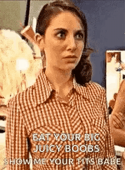 Woman In Plaid Shirt Talking To Mirror GIF