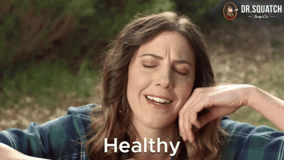 Woman In Plaid Shirt With Healthy Word GIF