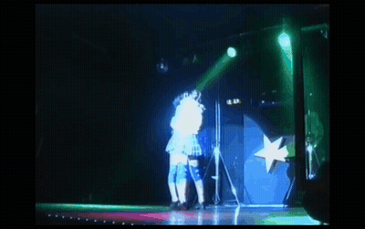 Woman In Plaid Skirt On Stage GIF