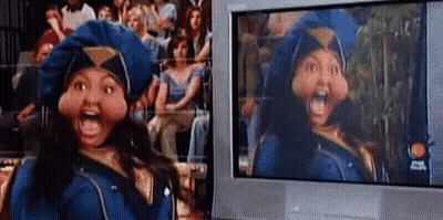 Woman In Police Uniform At Television Screen GIF