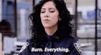 Woman In Police Uniform Saying Burn Everything GIF