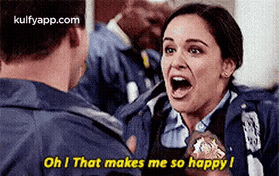 Woman In Police Uniform Screaming At Man Holding Badge GIF