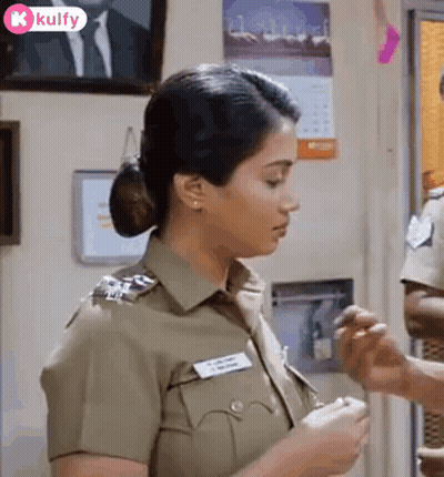 Woman In Police Uniform Standing Next To Man GIF