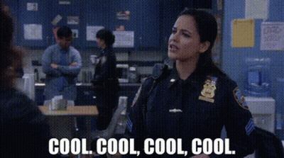 Woman In Police Uniform Talking To Man GIF