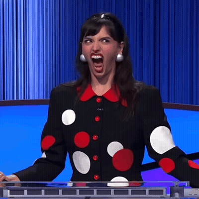 Woman In Polka Dot Jacket Making Funny Face GIF
