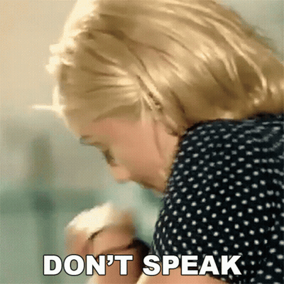 Woman In Polka Dot Shirt Says Don't Speak GIF