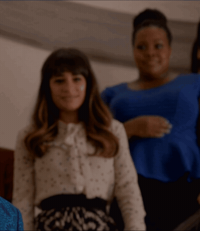 Woman In Polka Dot Shirt Smiling GIF