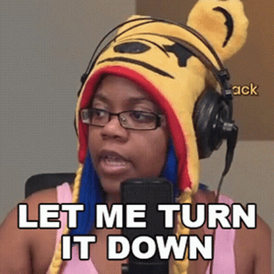 Woman In Pooh Hat And Headphones Saying Let Me Turn It Down GIF
