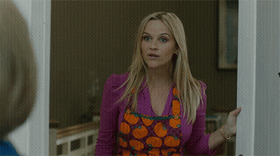 Woman In Pumpkin Apron Saying Oh GIF