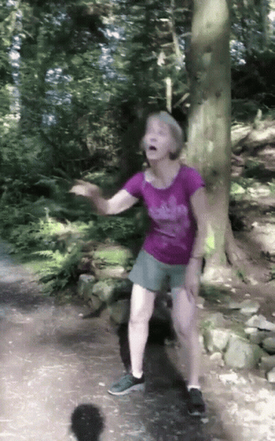 Woman In Purple Adidas Shirt Dancing In Woods GIF