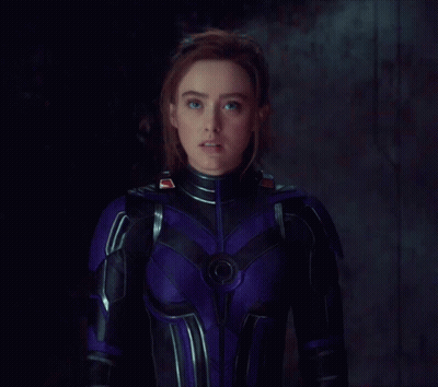 Woman In Purple And Black Superhero Costume GIF