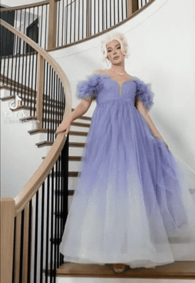 Woman In Purple And White Dress On Stairs GIF