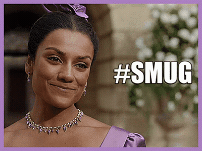 Woman In Purple Dress And Necklace Smiling #Smug GIF