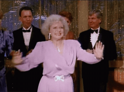 Woman In Purple Dress Before Tuxedo Group GIF