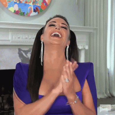 Woman In Purple Dress Clapping And Smiling GIF