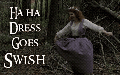 Woman In Purple Dress Dancing In Woods Saying Ha Ha Dress Goes Swish GIF