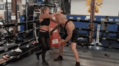 Woman In Purple Dress Dancing On Stage GIF