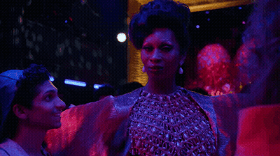 Woman In Purple Dress Dancing With Man In Baseball Cap GIF