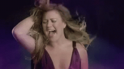 Woman In Purple Dress Dancing GIF