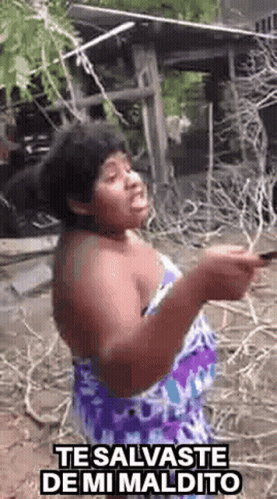 Woman In Purple Dress Holding Cell Phone GIF