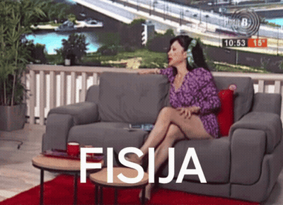 Woman In Purple Dress On Couch Saying Fisica GIF