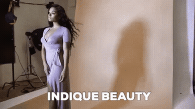 Woman In Purple Dress Posing GIF