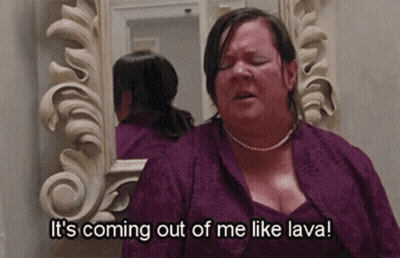 Woman In Purple Dress Saying It's Coming Out Of Me Like Lava GIF