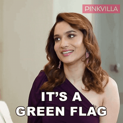 Woman In Purple Dress Saying Its A Green Flag GIF