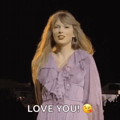 Woman In Purple Dress Saying Love You GIF