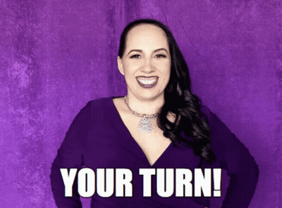 Woman In Purple Dress Smiling Your Turn GIF
