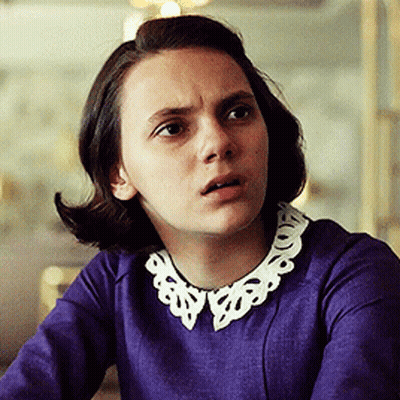 Woman In Purple Dress With White Collar GIF