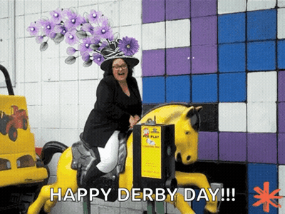 Woman In Purple Hat Riding Yellow Horse GIF