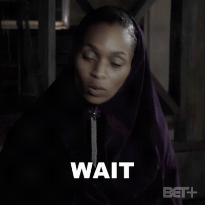 Woman In Purple Hooded Cape Saying Just Wait GIF