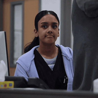 Woman In Purple Hoodie In Front Of Computer GIF