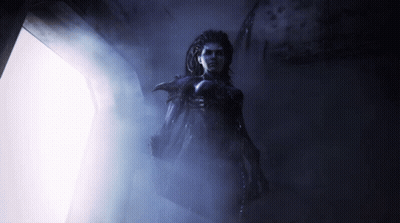 Woman in Purple in Dark Hallway