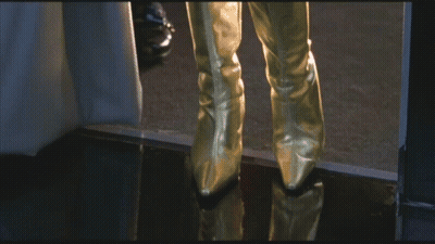 Woman In Purple Jacket And Gloves GIF