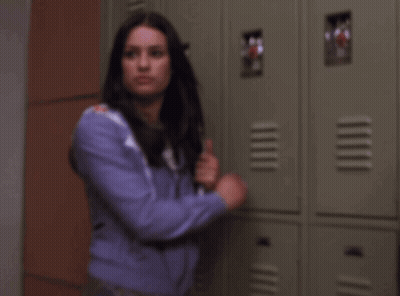 Woman In Purple Jacket Holding Knife And Red Cup With M GIF