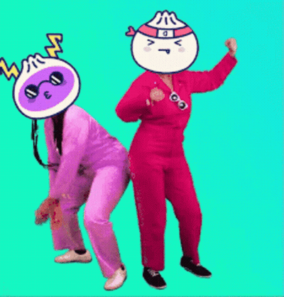 Woman In Purple Pants And Man In Red Pants Dancing GIF