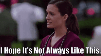 Woman In Purple Scrub Top With Stethoscope GIF
