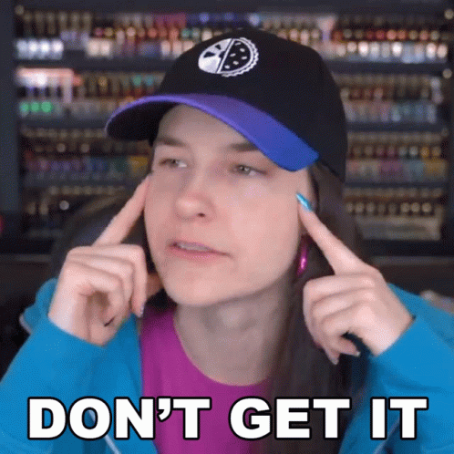 Woman In Purple Shirt And Black Hat Says Don't Get It GIF
