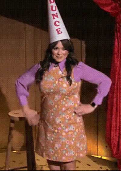 Woman In Purple Shirt And White Hat With Bounce GIF
