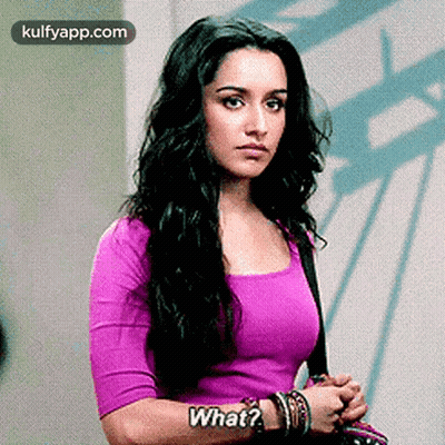 Woman In Purple Shirt Asking What GIF