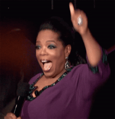 Woman In Purple Shirt Holding Microphone GIF