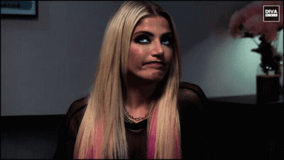 Woman In Purple Shirt Laughing In Front Of Diva Girls Logo GIF