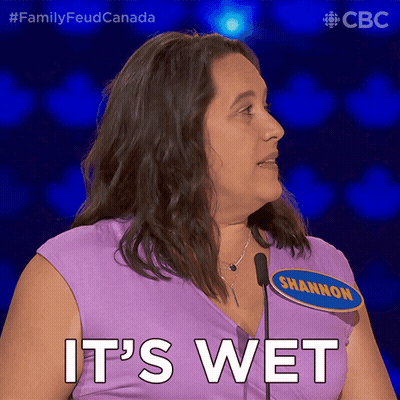 Woman In Purple Shirt Saying It's Wet GIF