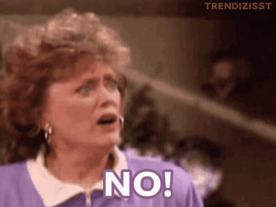 Woman In Purple Shirt Saying No GIF