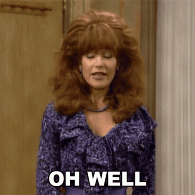 Woman In Purple Shirt Saying Oh Well GIF