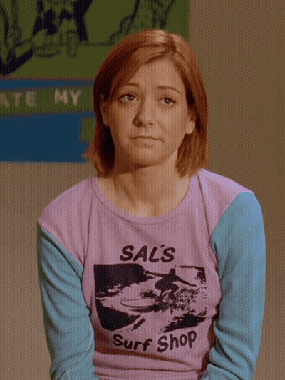 Woman In Purple Shirt Saying Sal's Surf Shop GIF